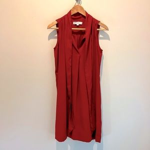 LOFT sleeveless pumpkin colored dress with scarf detail. Size small.